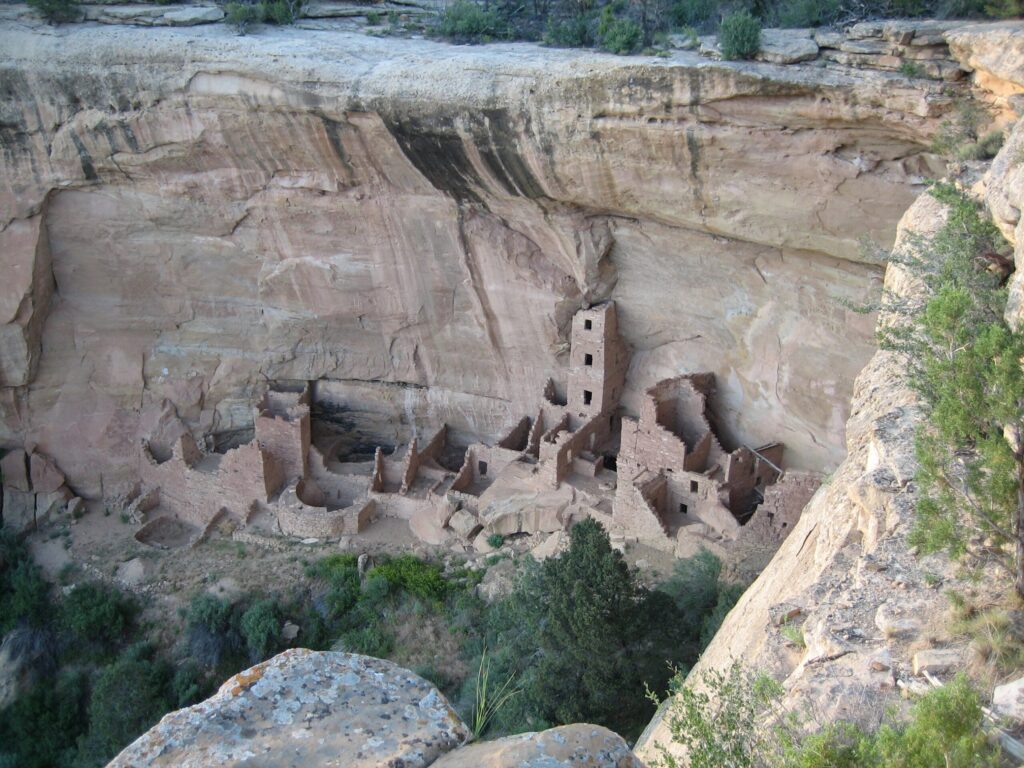 Square Tower House ruin in a sandstone alcove below the canyon rim at Mesa Verde National Park