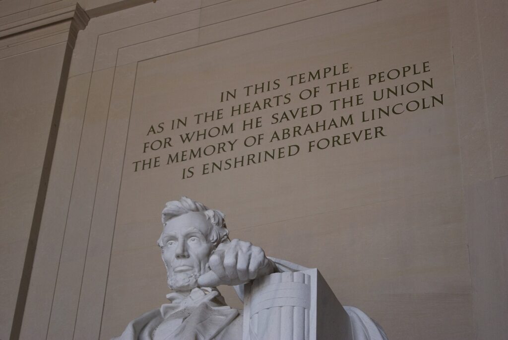 Lincoln statue and inscribed wall inside the Lincoln Memorial in Washington DC